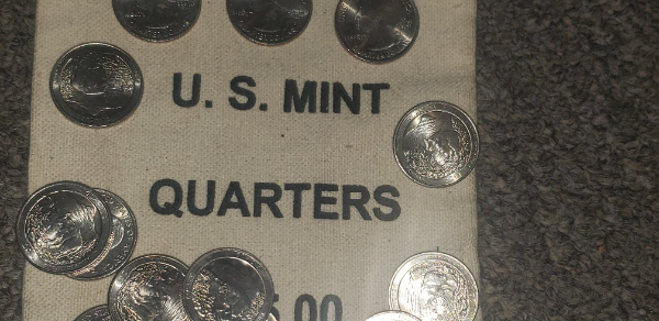 State-Quarters-With-A-Funny-Yellow-Glow....