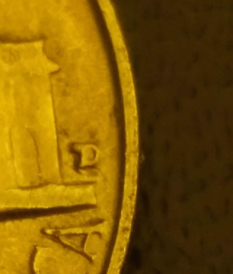 Not-Sure-If-It's-A-Mint-Mark-Over-Mimy-Mark-1958-D-5c-Jeffeson-Nickel