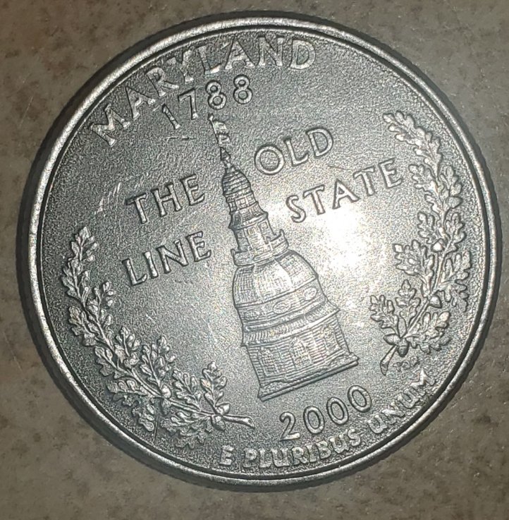 Maryland-State-Quarter-Looks-To-Be-Struck-On-A-Canadian-Quarter-Planchet?