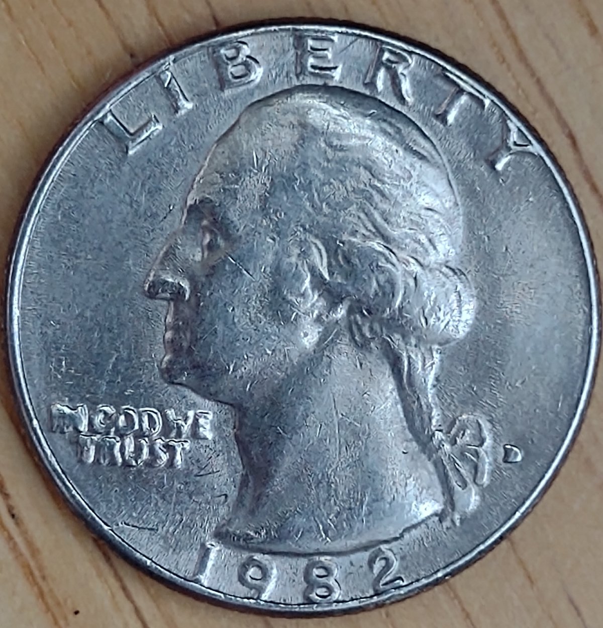 1982-D-25c-Washington-Quarter-Error-Obverse/I.g.w.t