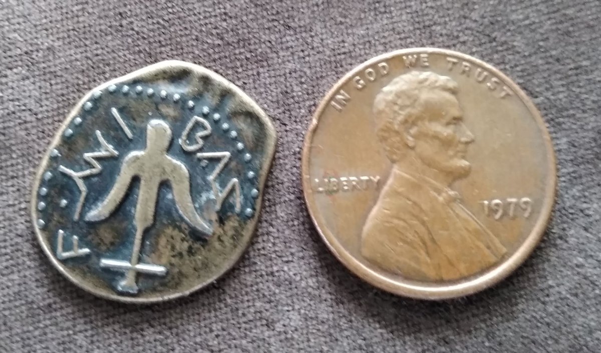 Novice-With-An-Unidentified-Coin