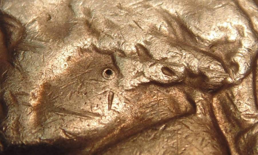 1964-Nickel-Hole-On-The-Cheek.