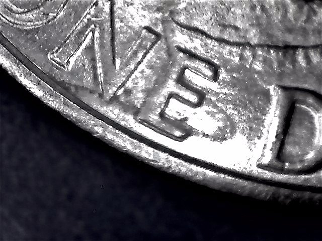 1971-Ike-Dollar-With-Something-Underneath-The-Strike?-Doubling-As-Well-Help
