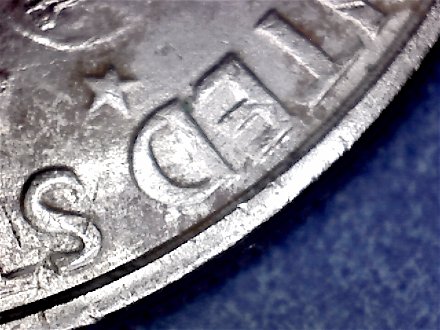 1971-Ike-Dollar-With-Something-Underneath-The-Strike?-Doubling-As-Well-Help