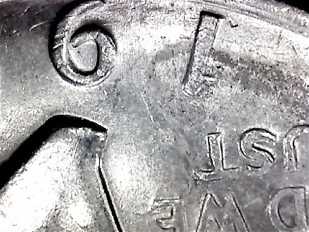 1971-Ike-Dollar-With-Something-Underneath-The-Strike?-Doubling-As-Well-Help