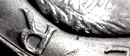 1971-Ike-Dollar-With-Something-Underneath-The-Strike?-Doubling-As-Well-Help