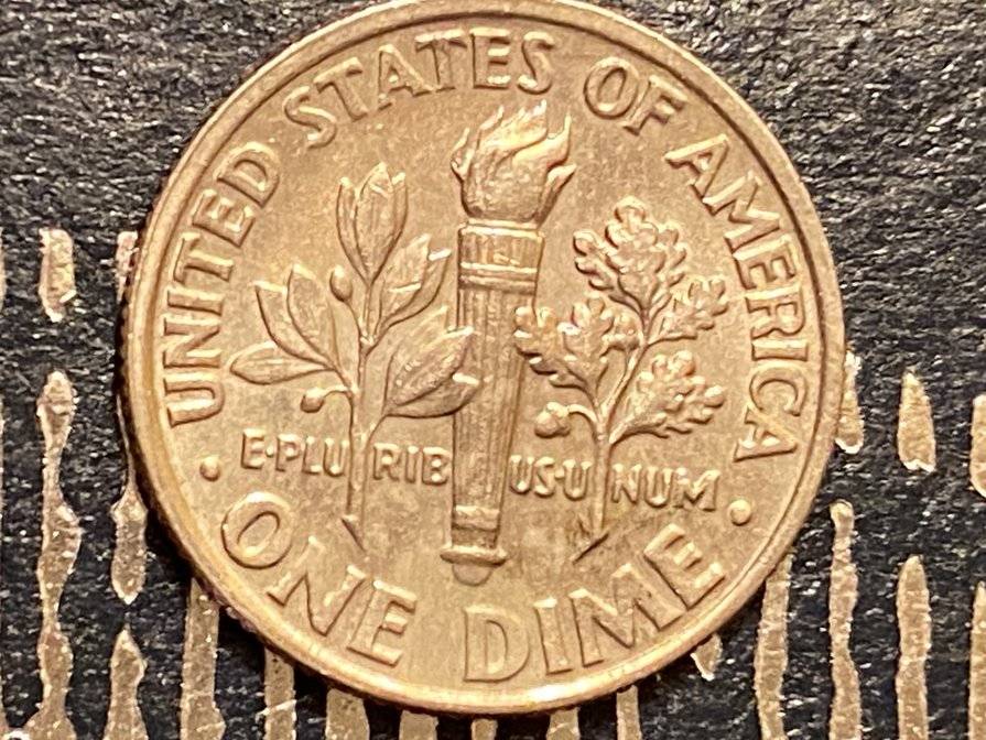 Something-Going-On-With-The-Rim-On-This-1989-P-Roosevelt-Dime