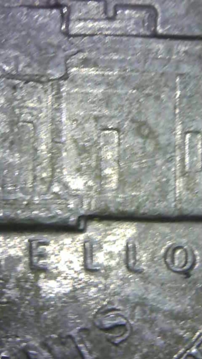 Is-This-Considered-Doubling-On-The-Building-On-Reverse-Of-88p-Jeff.-Nickel?