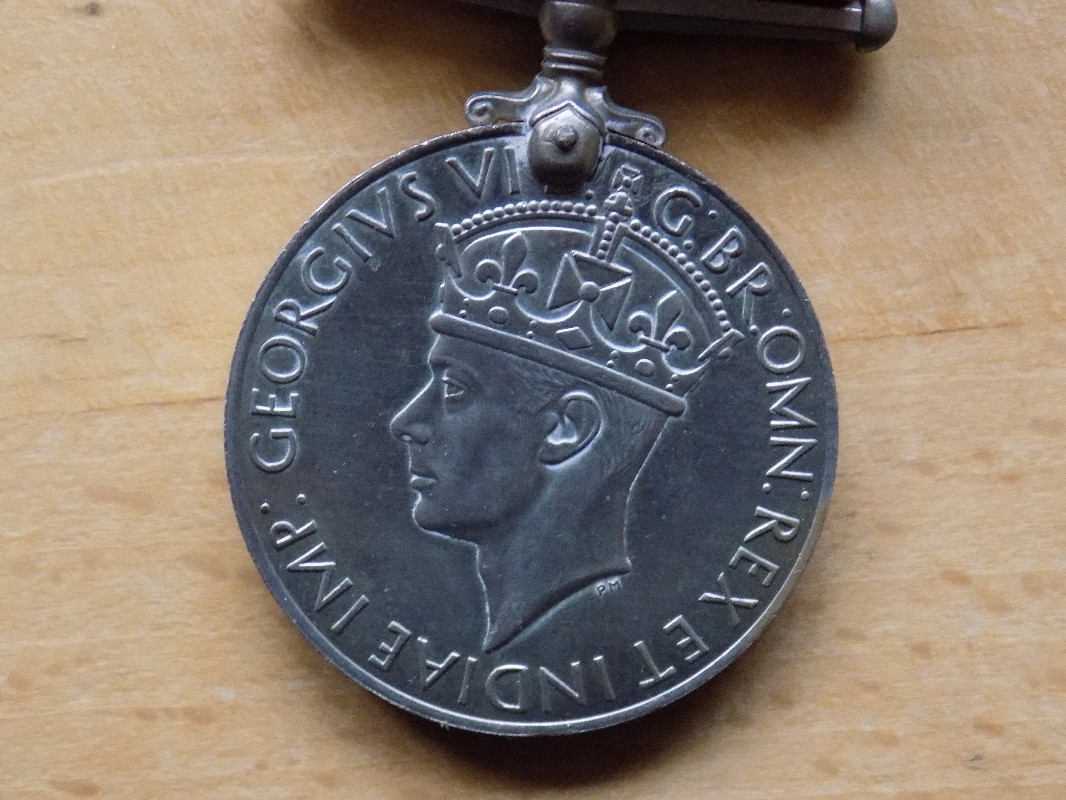 Post-A-Coin-Or-Medal-Devoted-To-A-Military-Subject