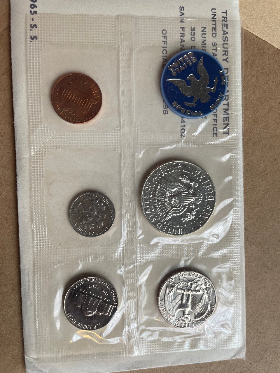 Damaged-Quarter-In-1965-S.s.-Mint-Set.-Both-Sides.-Looking-For-Info