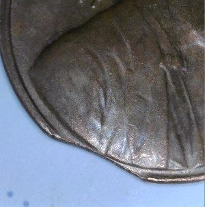Could-This-1982-LMC-Be-A-Minor-Clipped-Planchet-Or-PMD?