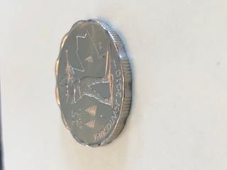 Scalloped-World-Coins-In-2010