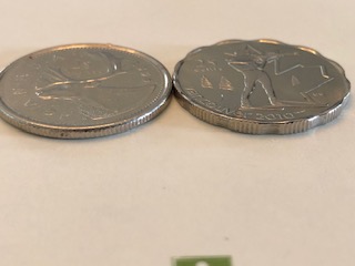 Scalloped-World-Coins-In-2010
