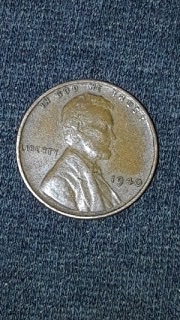 1940-One-Cent-Coin-Few-Error.-Mint-Under-Liberty-?