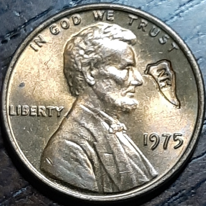 1975-Penny-With-What-Looks-Like-The-State-Of-NH-Pressed-Into-It
