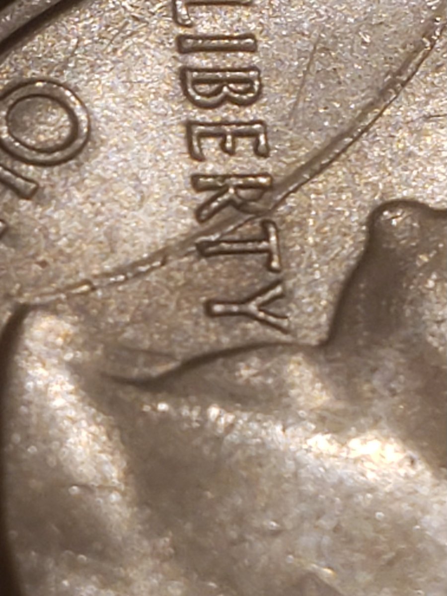 2018-Quarter-Struck-Through-Large-Rim-Burr