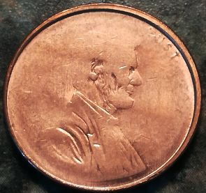 2000?-Cent-Grease-Filled-Die?