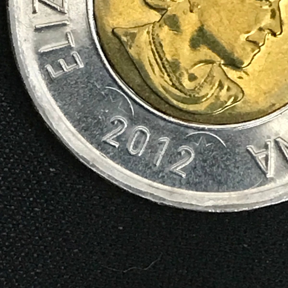 2012-Toonie-With-Strike-Through-And-Queen-Error