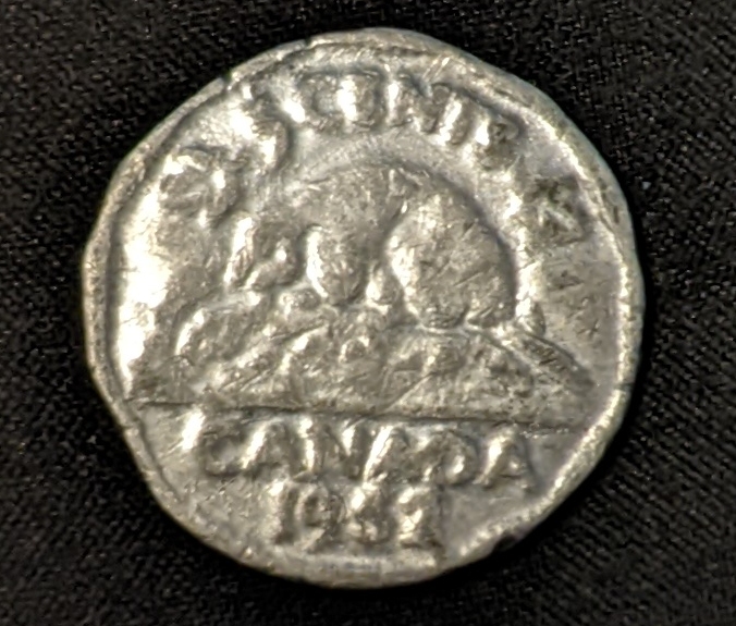 1952-5-Cent.front-Double-Struck-With-Voyageur?