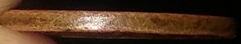 1950-Something-D-Lincoln-Penny-Possible-Struck-Through-Grease?