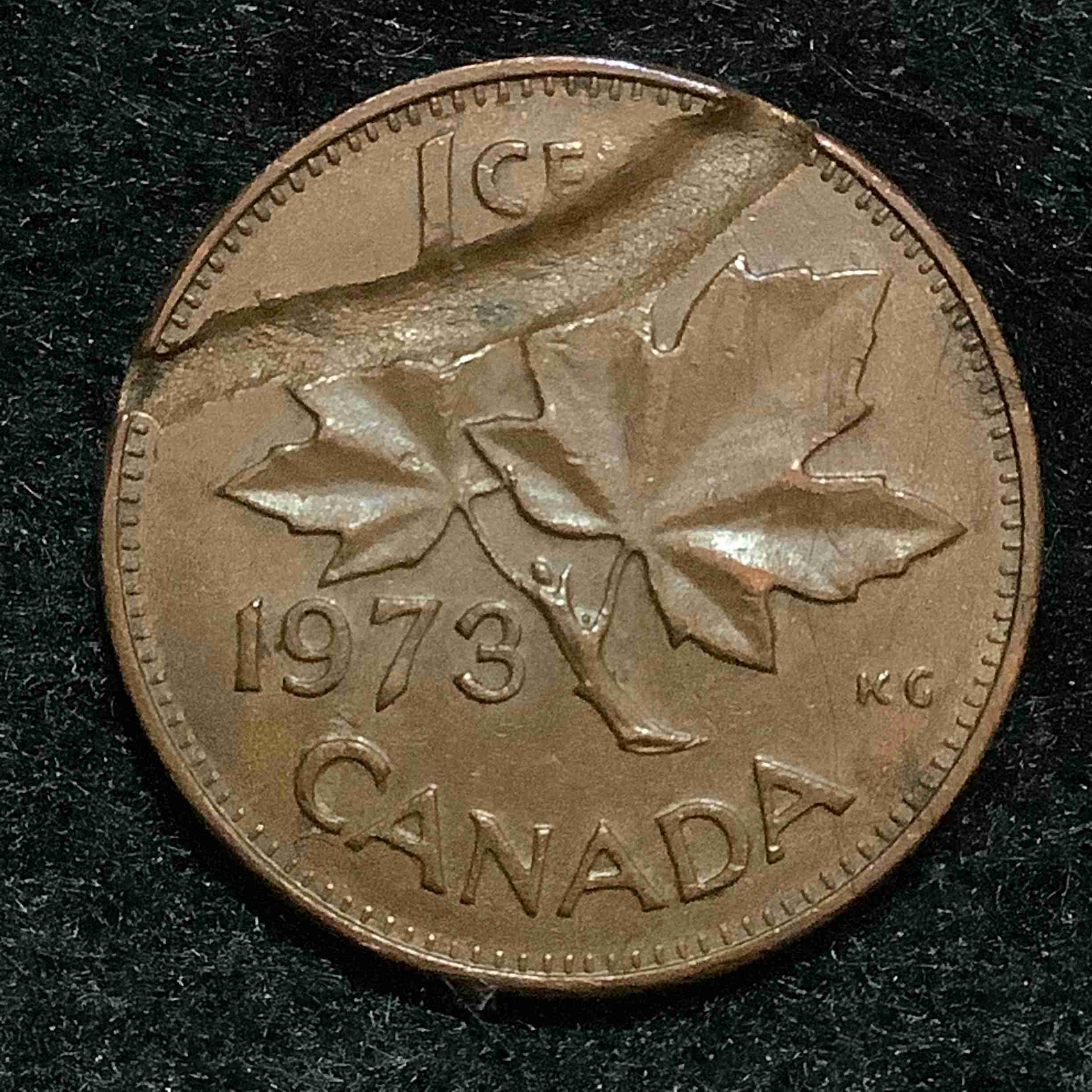 1973-1-Cent-Strike-Through-Or-Flawed-Planchet?