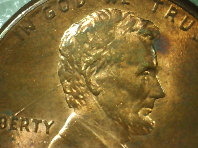 1990-P-Red-Penny-With-Long-Die-Break-On-Front-Going-From-E-Thru-His-Head
