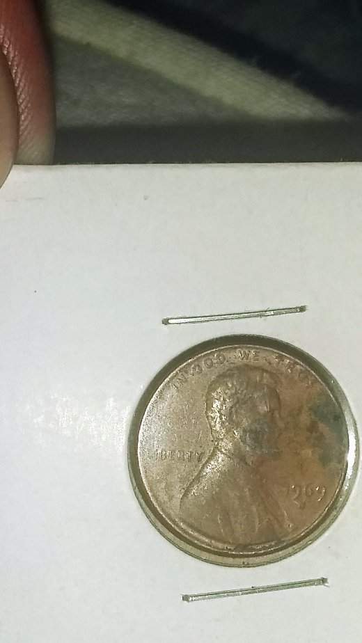 1969-D-LMC-With-Circulation-Damage-Ghost-Face