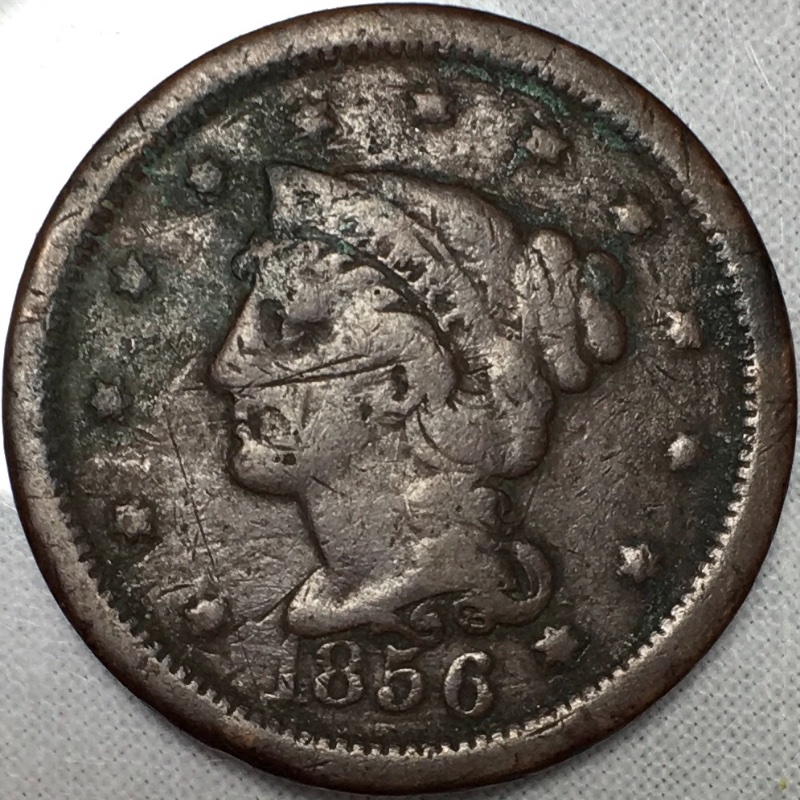What-Are-These-Dents-On-The-Rim-Of-This-Large-Cent?