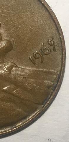 1965?-Or-1967?-Mis-Punched-Date-With-Possible-Double-Die.