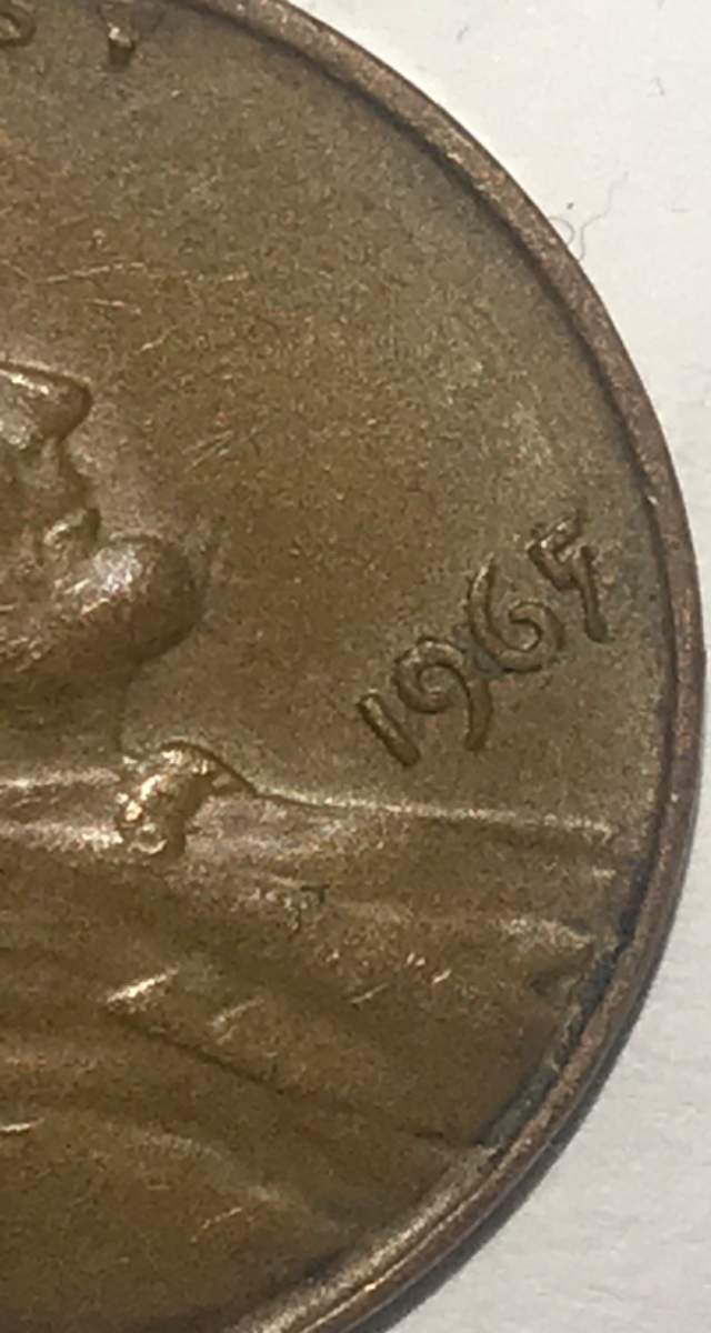 1965?-Or-1967?-Mis-Punched-Date-With-Possible-Double-Die.