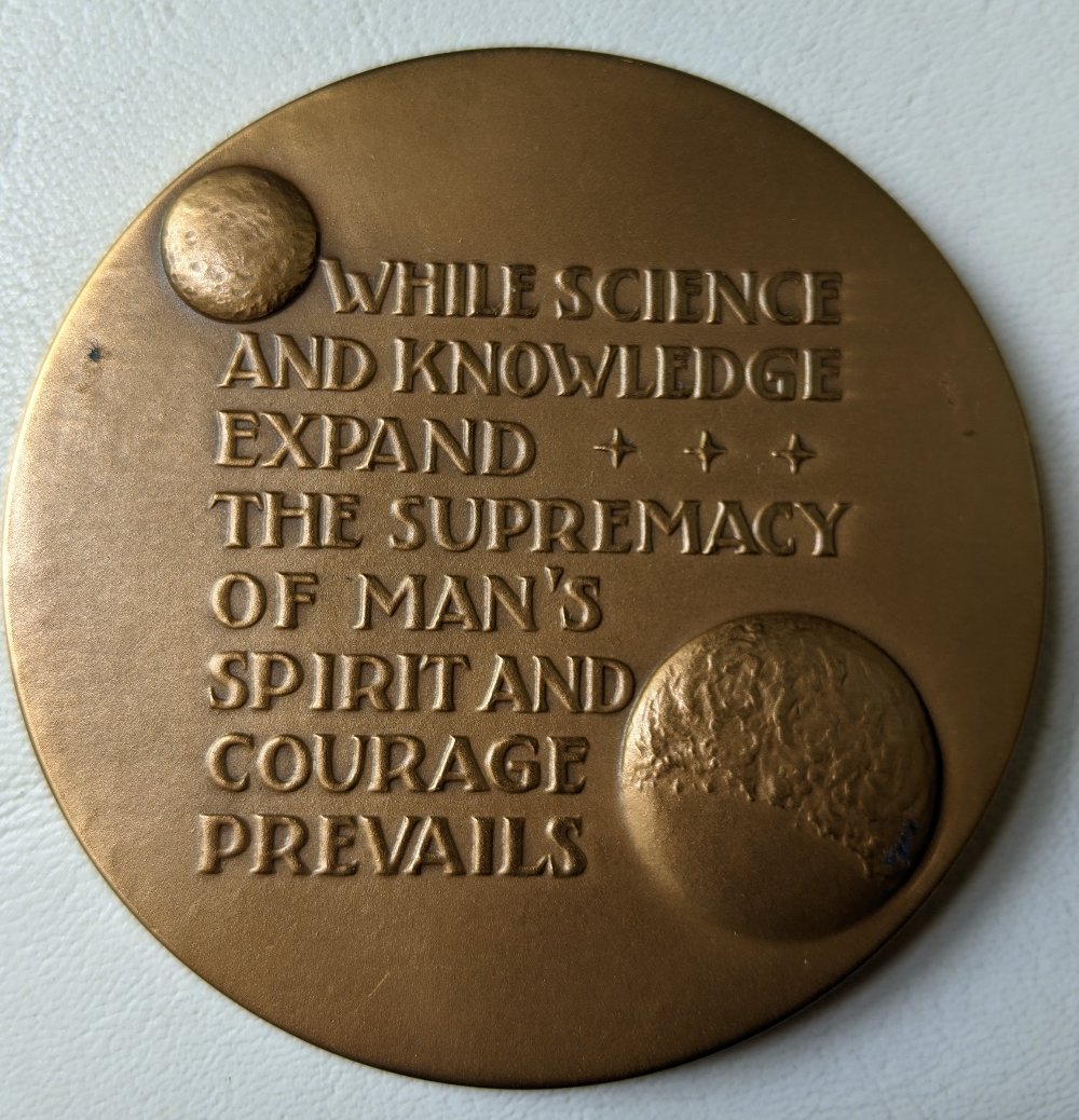 Post-A-Coin-Or-Medal-Related-To-Space-Travel.