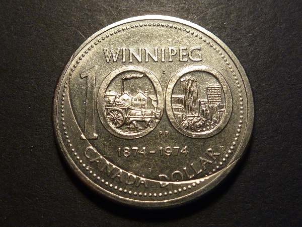 1974-Nickel-Dollar-With-Incomplete-Clip-And-Doubled-Yoke.