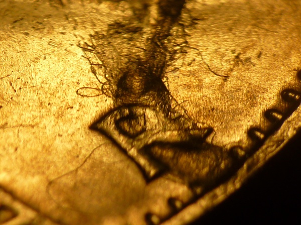 1976-Nickel-Dollar,-Struck-Through-Braided-Twine