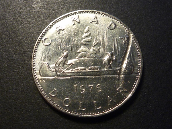 1976-Nickel-Dollar,-Struck-Through-Braided-Twine