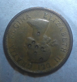 Opinions-On-A-1964-Canadian-Penny,-Error-Or-Damaged?