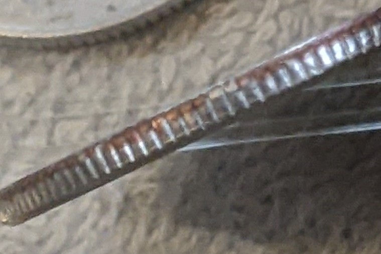 2019-Quarter-Looks-Like-Opposite-Edge-Clad-Layer-Folded-Over-The-Edge-Of-The-Coin-And-Was-Struck