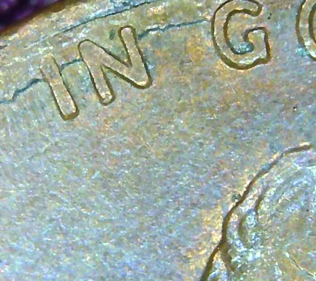 1987-Penny-With-A-Crack-Under-The-Letters?