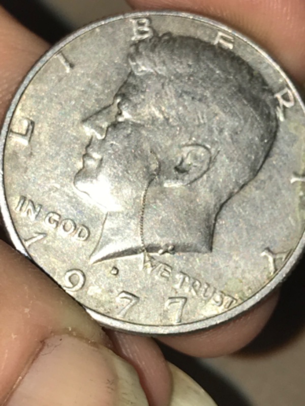 1977-Kennedy-Half-Dollar-With-Really-Cool-Struck-Through-Error-If-Not-I'm-Still-Keeping-It