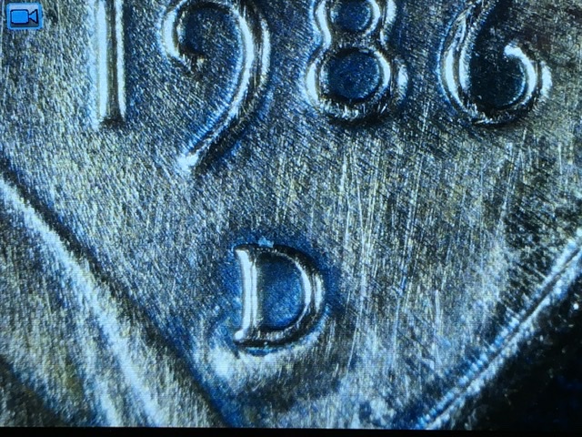 1986-D,-MM-Looks-Like-It's-Riding-A-Wave,-MM-On-Reverse?