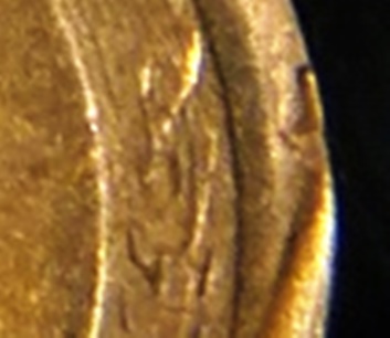 1942-S-Penny-With-An-L-Stamped-On-The-Rim