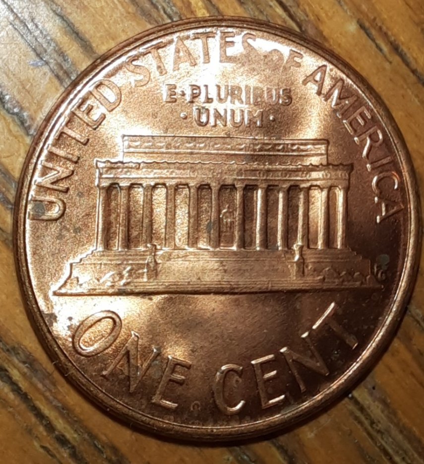 1988-Penny.-Is-The-Top-Of-The-Reverse-Faint-From-A-Grease-Strike?