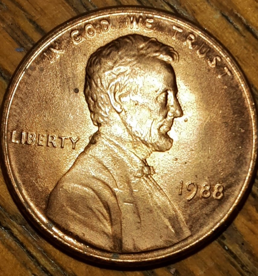 1988-Penny.-Is-The-Top-Of-The-Reverse-Faint-From-A-Grease-Strike?