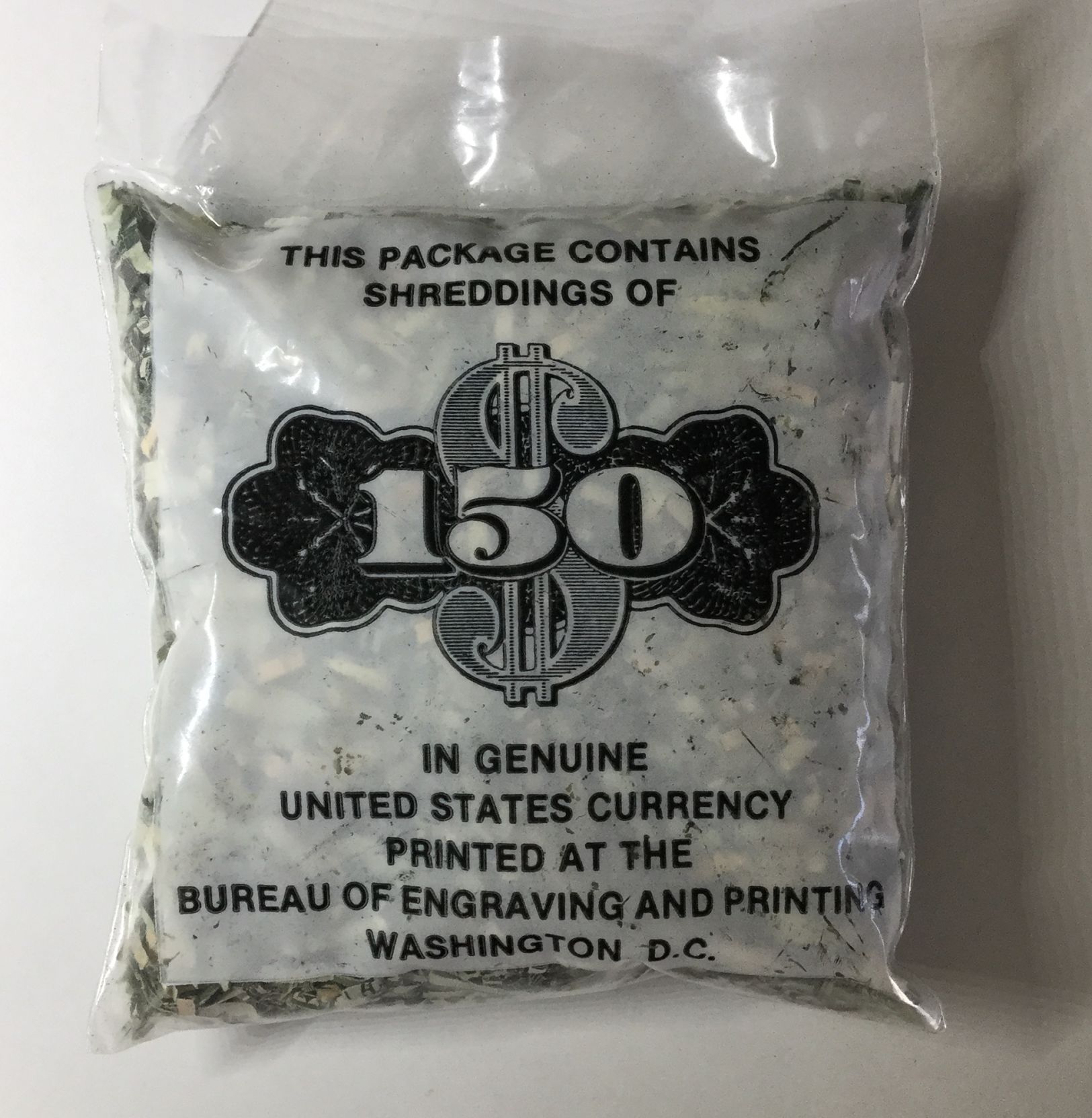 Unusual-Ebay-Auction:-Shredded-Federal-Reserve-Notes-In-Small-Jar