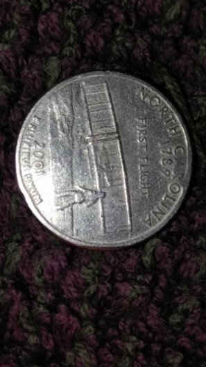 Hello,-Help-Needed,-2001-State-Quarter-With-Unknown-Surface-Metal-And-Rims