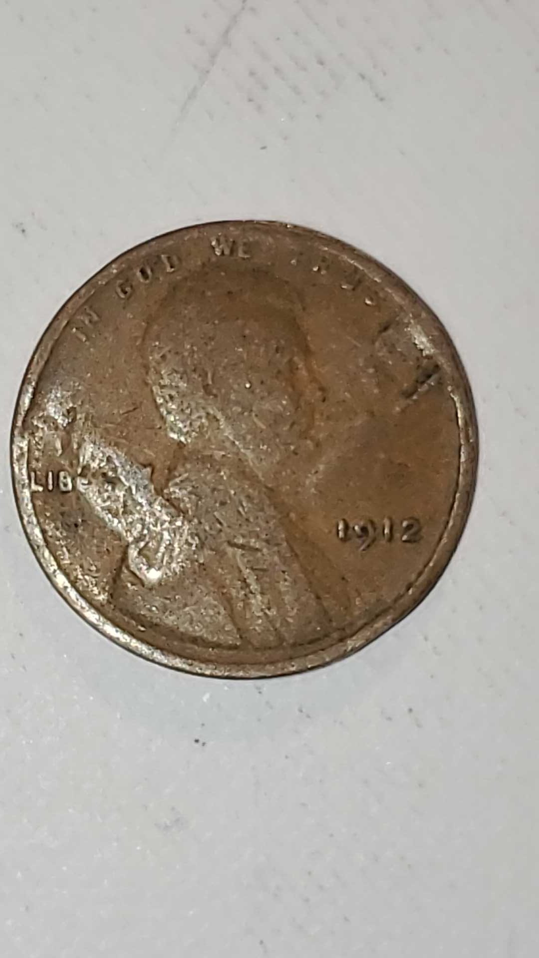 1912-Wheat-Penny-With-Large-Dent?-Not-Sure-What-To-Call-It