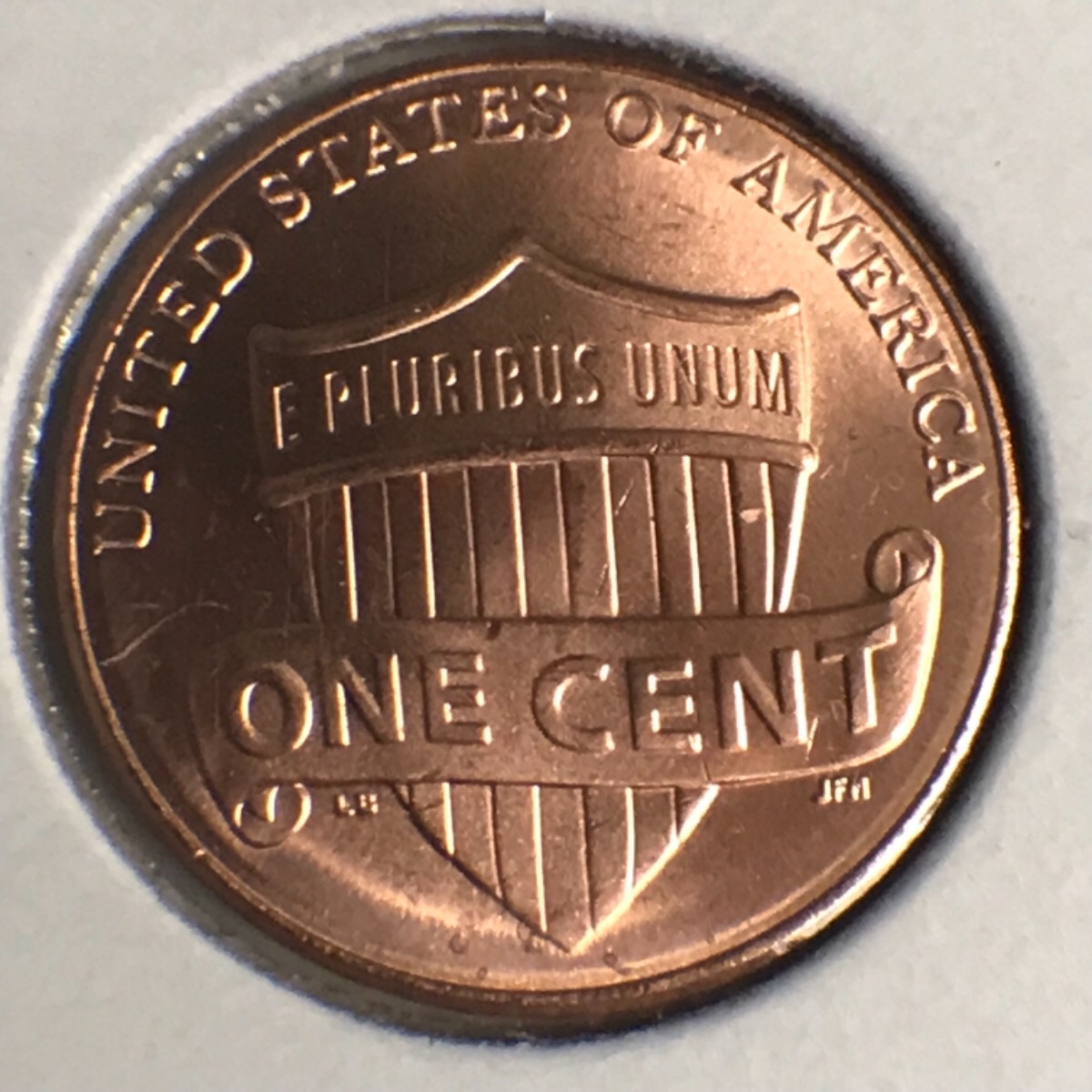 What-Causes-This-Metal-Movement-Near-Rim-Of-This-Cent?