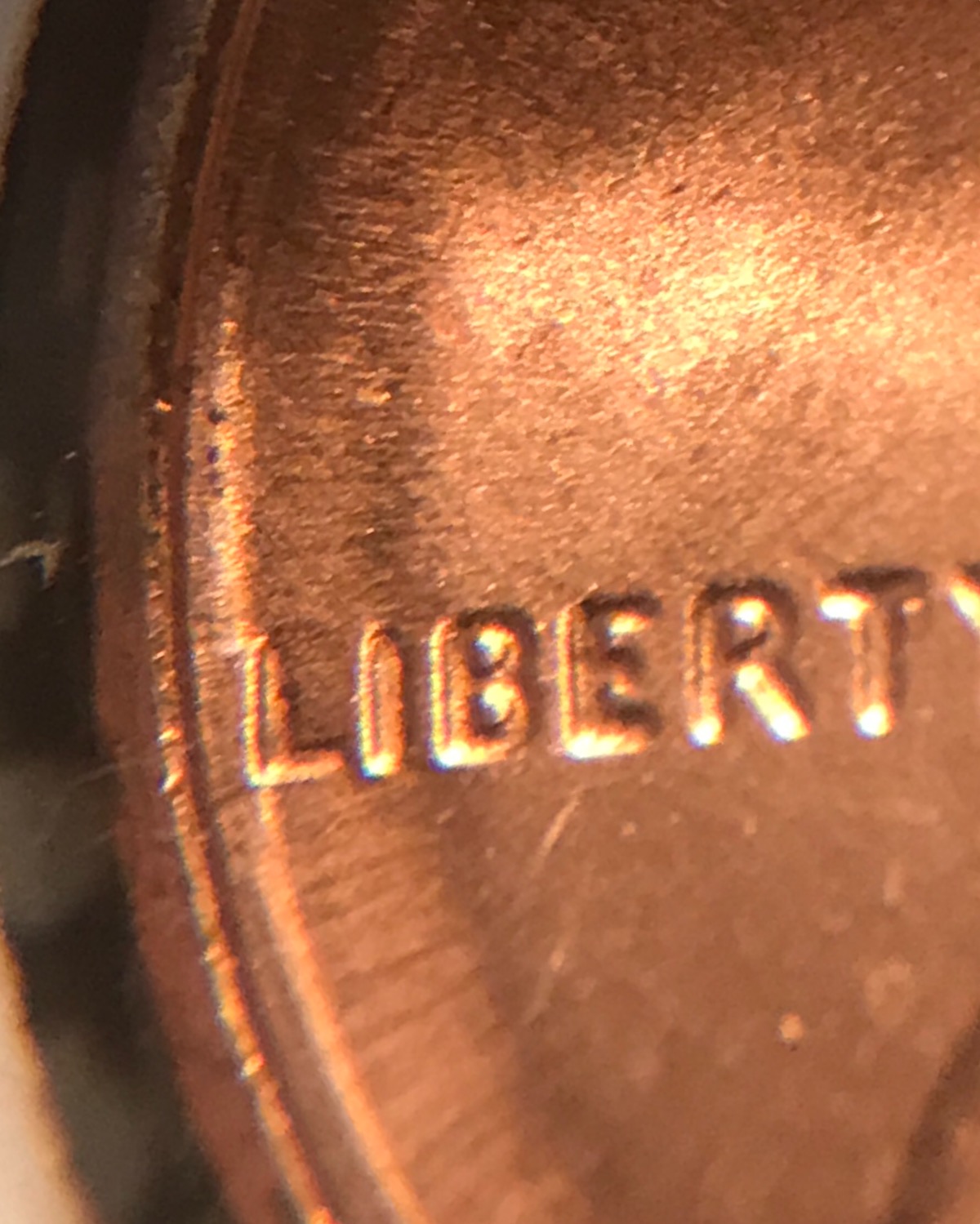 What-Causes-This-Metal-Movement-Near-Rim-Of-This-Cent?