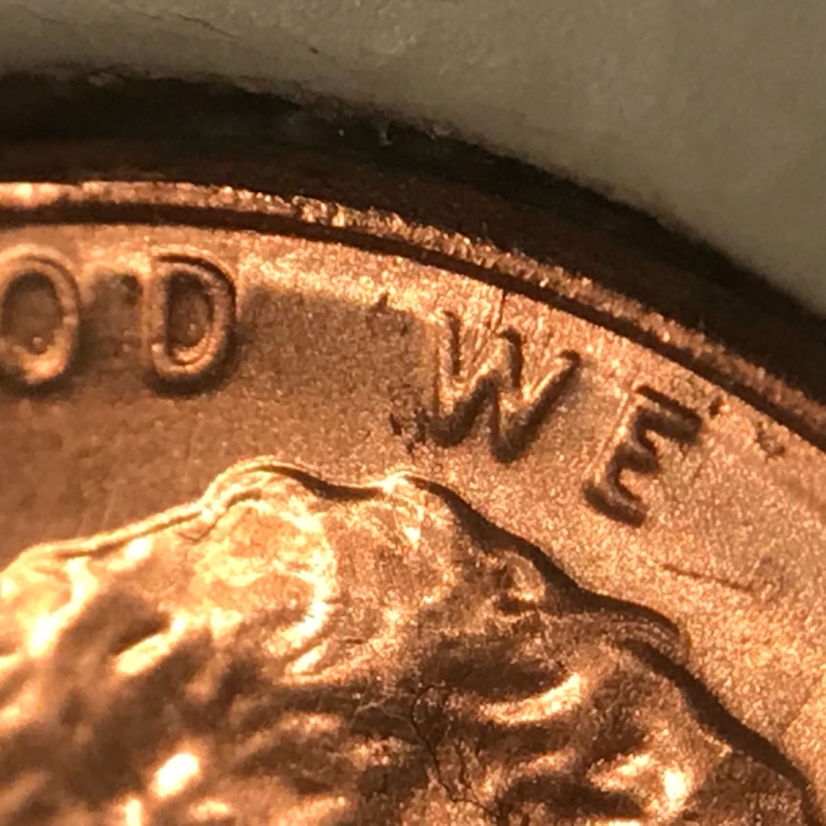 What-Causes-This-Metal-Movement-Near-Rim-Of-This-Cent?