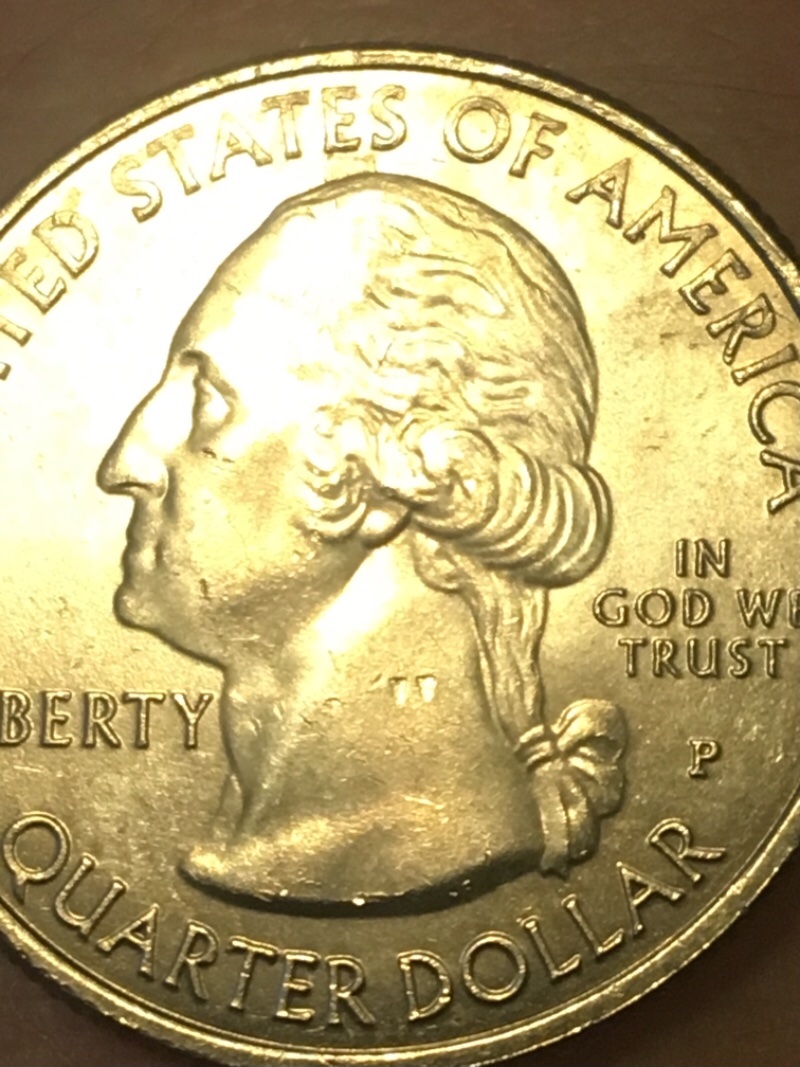 Quarter-With-Possible-Rockwell-Test-Mark-Two-Triangle-Shaped-Marks