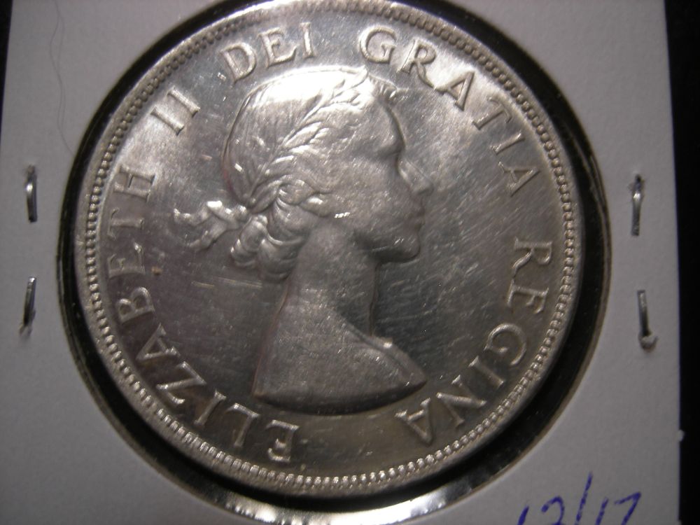 1953-Dollar---It-Hurts-To-Get-Crowned